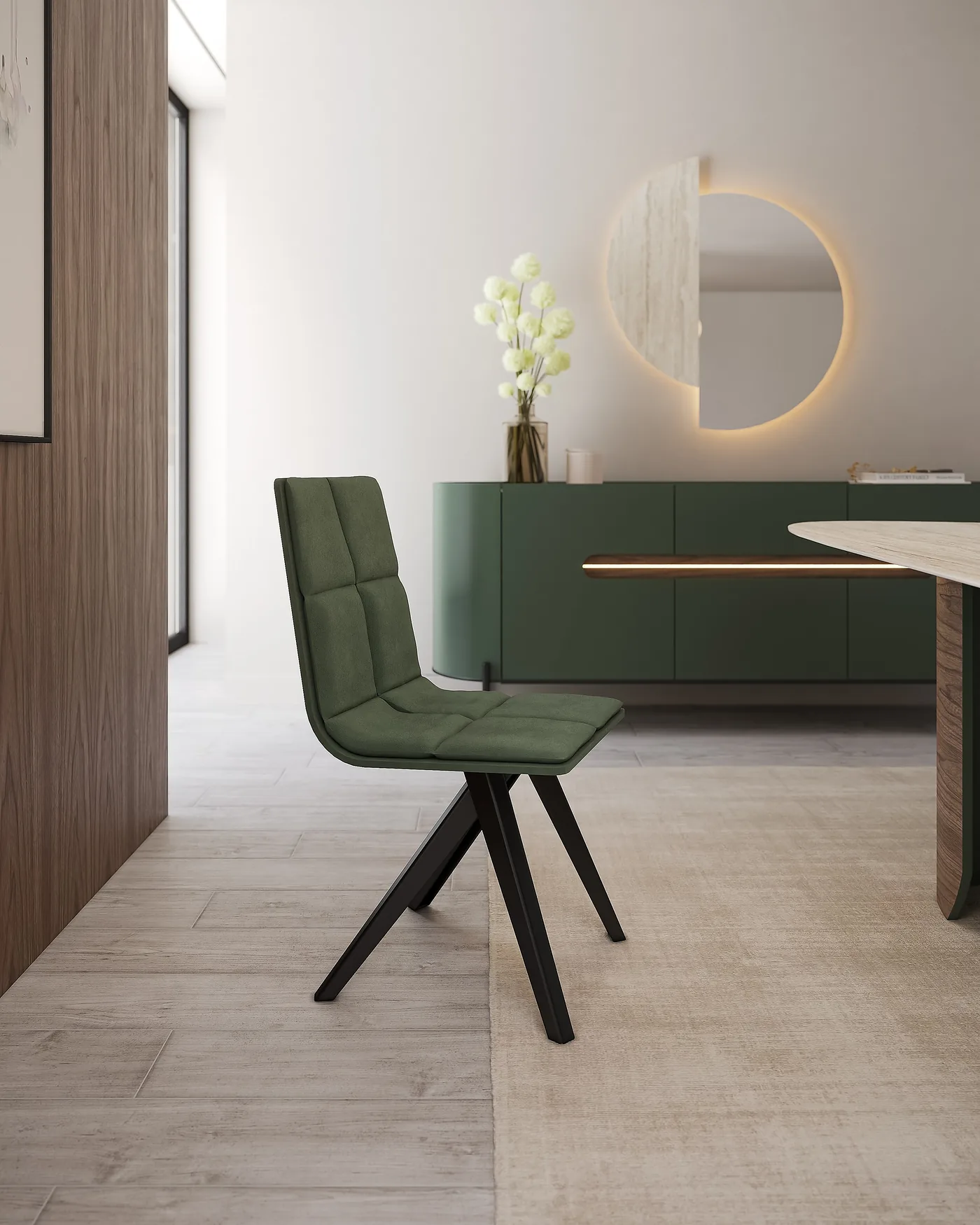 Chaise en tissu vert au dossier piqué, pieds noirs en étoile